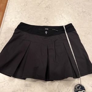Gently worn Ivivva skirt with built in shorts